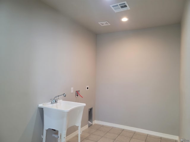 13129 E 47th Ln, Yuma, AZ 85367 - laundry area with laundry area, a sink, recessed lighting, light tile patterned floors, and visible vents