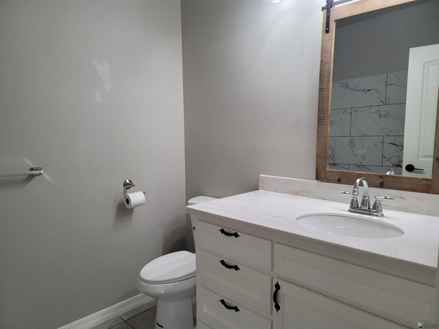 13129 E 47th Ln, Yuma, AZ 85367 - bathroom featuring vanity, tile patterned flooring, baseboards, and toilet