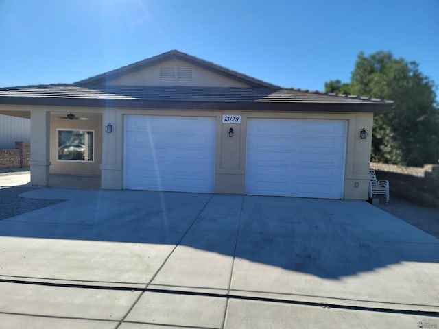 13129 E 47th Ln, Yuma, AZ 85367 - garage featuring concrete driveway