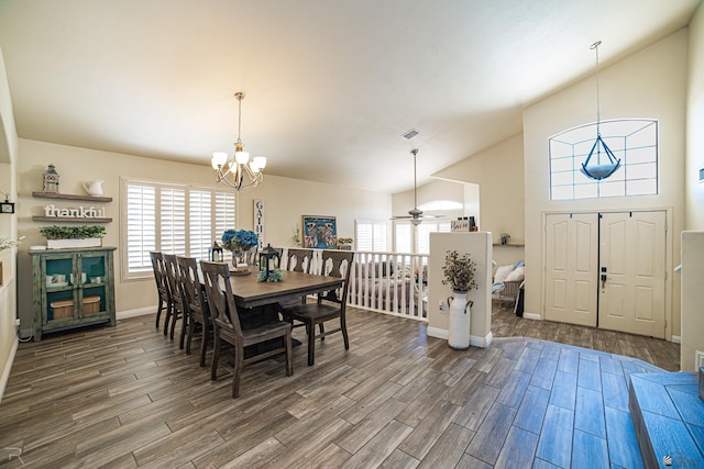 4031 W 16th Pl, Yuma, AZ 85364 - dining room with high vaulted ceiling, wood finished floors, a chandelier, a ceiling fan, and baseboards