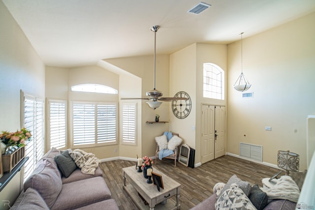 4031 W 16th Pl, Yuma, AZ 85364 - living area featuring high vaulted ceiling, healthy amount of natural light, wood finished floors, baseboards, and a ceiling fan