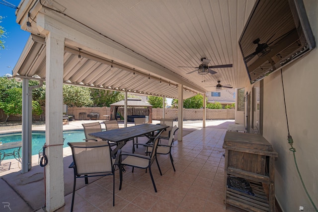 4031 W 16th Pl, Yuma, AZ 85364 - fenced backyard with a gazebo, a patio area, and ceiling fan
