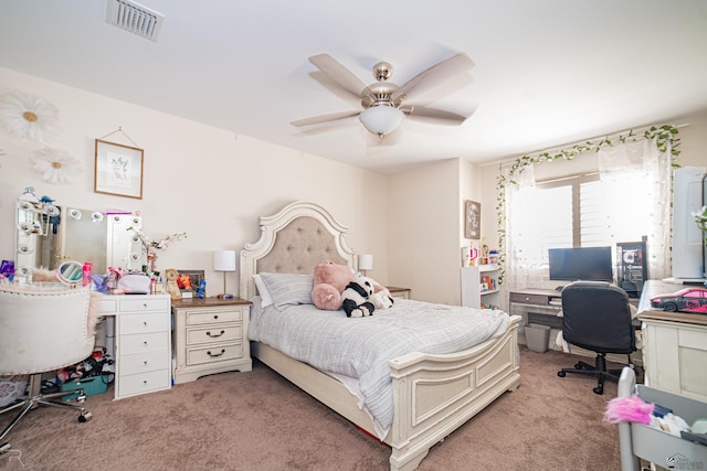 4031 W 16th Pl, Yuma, AZ 85364 - bedroom with carpet, a desk, and a ceiling fan