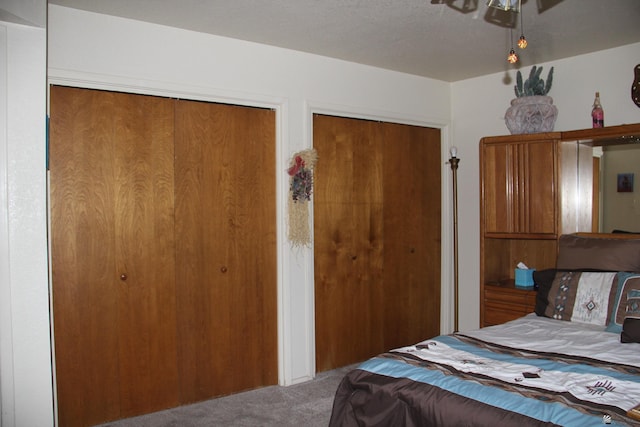1936 W 15th Pl, Yuma, AZ 85364 - carpeted bedroom featuring multiple closets