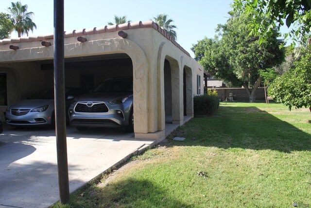 1936 W 15th Pl, Yuma, AZ 85364 - view of vehicle parking featuring a carport
