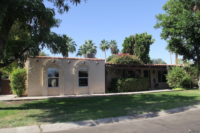 1936 W 15th Pl, Yuma, AZ 85364 - mediterranean / spanish house featuring a front yard and stucco siding