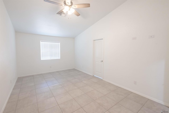 376 N 22nd Dr, San Luis, AZ 85336 - unfurnished room featuring a ceiling fan, baseboards, light tile patterned flooring, and lofted ceiling