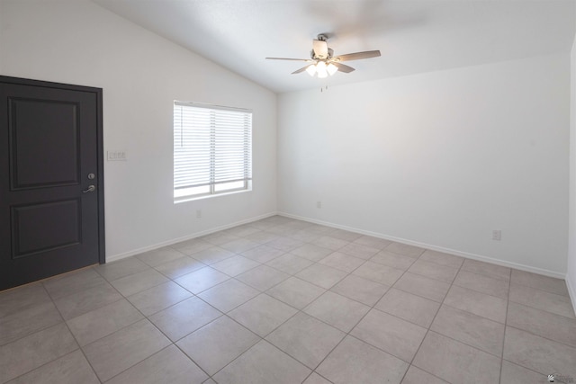 376 N 22nd Dr, San Luis, AZ 85336 - empty room featuring baseboards, ceiling fan, lofted ceiling, and light tile patterned flooring