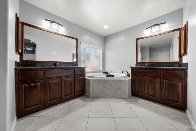 6194 E 46th Ln, Yuma, AZ 85365 - bathroom with a garden tub, tile patterned floors, and two vanities