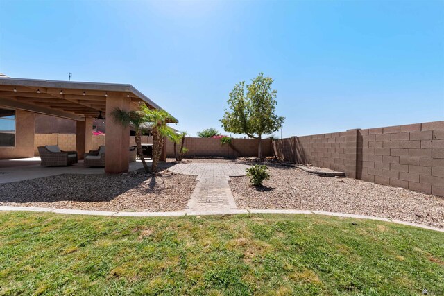 6194 E 46th Ln, Yuma, AZ 85365 - view of yard featuring a patio and an outdoor hangout area
