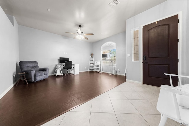 6194 E 46th Ln, Yuma, AZ 85365 - foyer featuring a ceiling fan, baseboards, and light tile patterned floors