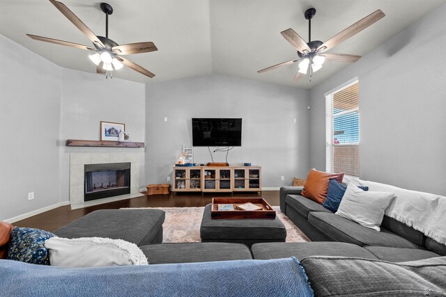 6194 E 46th Ln, Yuma, AZ 85365 - living room with a ceiling fan, vaulted ceiling, baseboards, a fireplace, and wood finished floors
