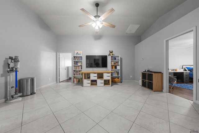 6194 E 46th Ln, Yuma, AZ 85365 - living room featuring ceiling fan, light tile patterned floors, baseboards, and lofted ceiling