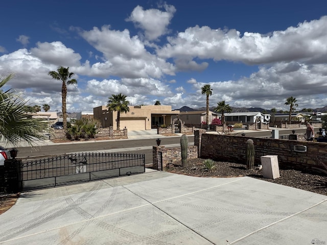 13815 E 54th St, Yuma, AZ 85367 - view of patio / terrace featuring a fenced front yard and a gate