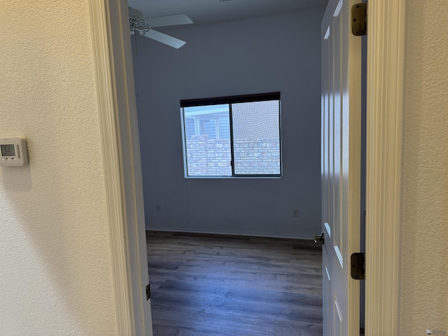 13815 E 54th St, Yuma, AZ 85367 - spare room with a ceiling fan, a textured wall, and wood finished floors