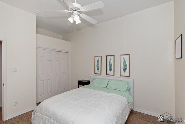 10758 E 39th St, Yuma, AZ 85365 - bedroom with a closet, baseboards, wood finished floors, and a ceiling fan