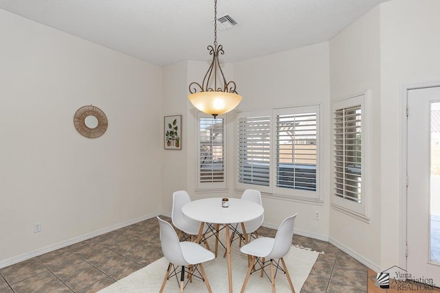 10758 E 39th St, Yuma, AZ 85365 - dining space featuring baseboards