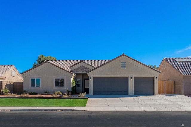 ranch-style home with a garage