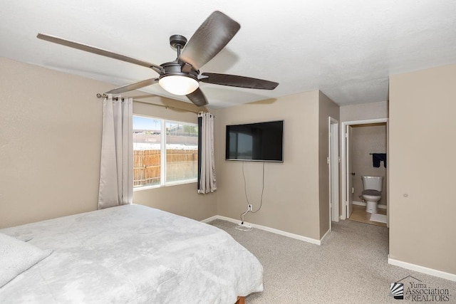 carpeted bedroom with baseboards and ceiling fan