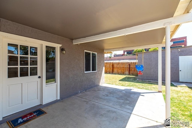 view of patio / terrace with fence