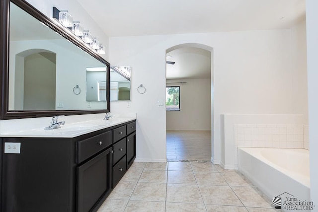 2967 S 47th Ave, Yuma, AZ 85364 - full bathroom with double vanity, tile patterned flooring, and a bath