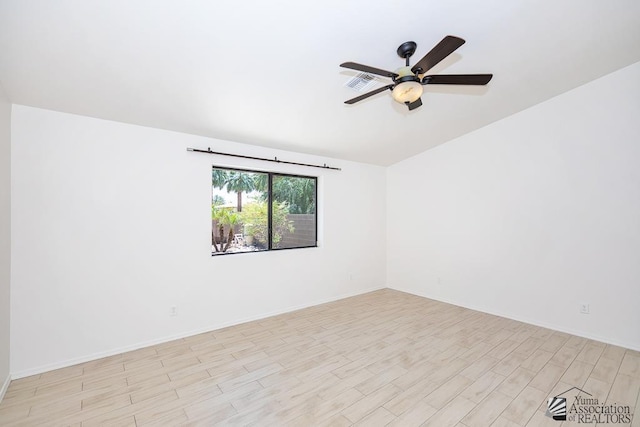 2967 S 47th Ave, Yuma, AZ 85364 - unfurnished room featuring light wood finished floors, ceiling fan, and lofted ceiling