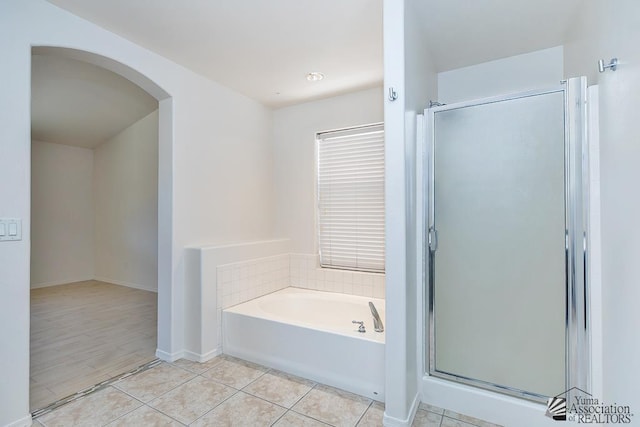 2967 S 47th Ave, Yuma, AZ 85364 - bathroom with a bath, a shower stall, and tile patterned floors