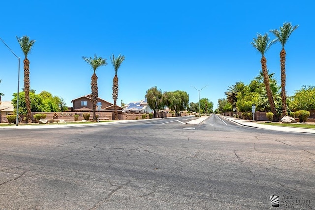 2967 S 47th Ave, Yuma, AZ 85364 - view of asphalt road featuring sidewalks, street lights, and curbs