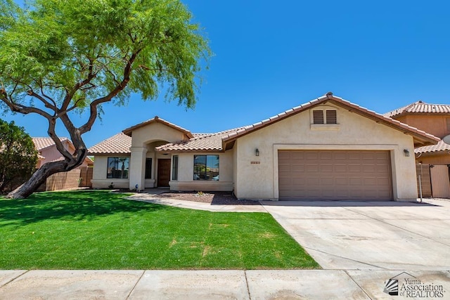 2967 S 47th Ave, Yuma, AZ 85364 - mediterranean / spanish-style home with a garage, stucco siding, concrete driveway, and a tiled roof