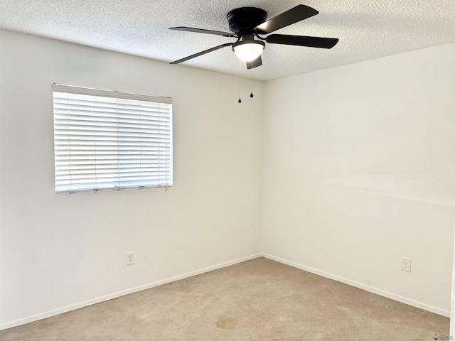 1805 S Dora Ave, Yuma, AZ 85364 - spare room featuring a ceiling fan, light colored carpet, and a textured ceiling