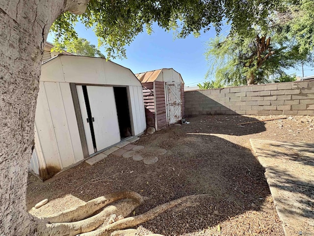 1805 S Dora Ave, Yuma, AZ 85364 - view of shed featuring a fenced backyard