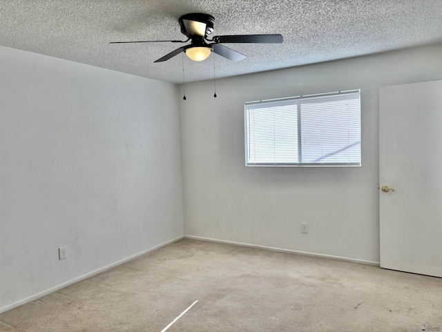 1805 S Dora Ave, Yuma, AZ 85364 - carpeted empty room with a textured ceiling and a ceiling fan