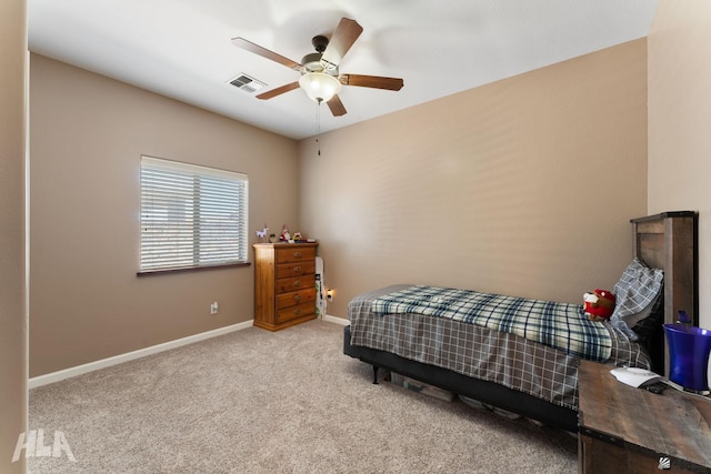 bedroom with carpet floors, a ceiling fan, baseboards, and visible vents