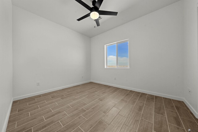 10778 E 45th Ln, Yuma, AZ 85367 - spare room with wood finished floors, ceiling fan, and baseboards