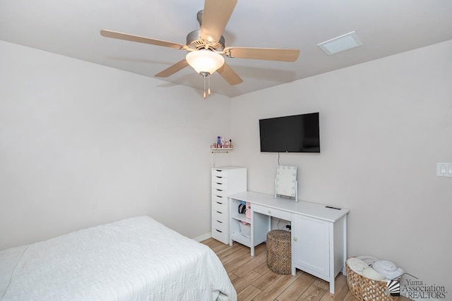 10120 S Galaxy Ave, Yuma, AZ 85367 - bedroom featuring visible vents, a ceiling fan, baseboards, and light wood-type flooring