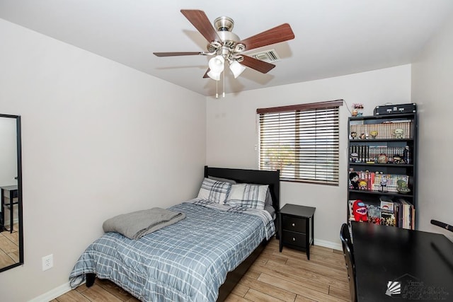 10120 S Galaxy Ave, Yuma, AZ 85367 - bedroom featuring baseboards, ceiling fan, light wood finished floors, and visible vents