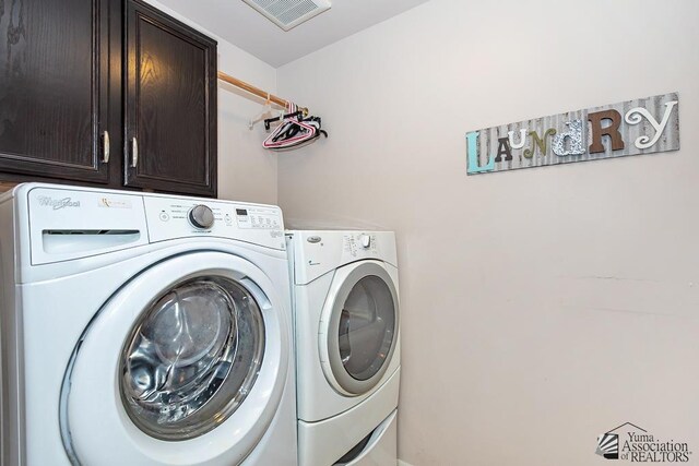 10120 S Galaxy Ave, Yuma, AZ 85367 - laundry area with visible vents, cabinet space, and washing machine and clothes dryer