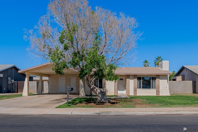 2140 S 28th Ave, Yuma, AZ 85364 - single story home with driveway and an attached carport