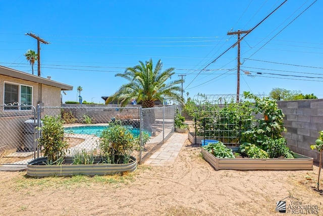 285 E 26th St, Yuma, AZ 85364 - view of pool featuring a garden