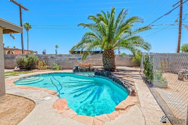285 E 26th St, Yuma, AZ 85364 - view of swimming pool with a fenced backyard and a patio area