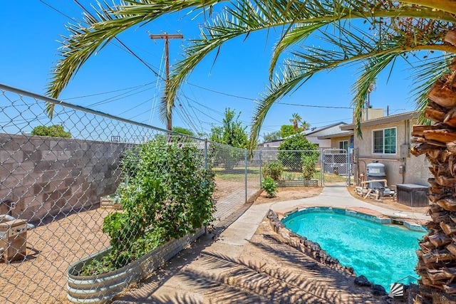 285 E 26th St, Yuma, AZ 85364 - view of swimming pool featuring a gate
