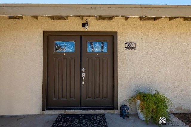 285 E 26th St, Yuma, AZ 85364 - property entrance with stucco siding