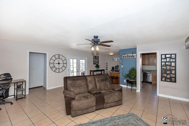 285 E 26th St, Yuma, AZ 85364 - living area with light tile patterned floors, a ceiling fan, french doors, and a desk