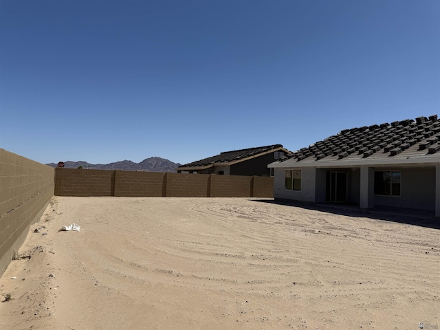 12684 S 50th Dr, Yuma, AZ 85367 - view of yard with a fenced backyard and a mountain view