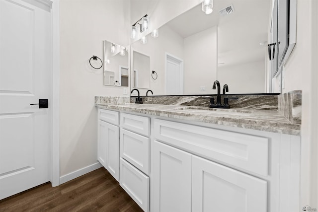 4236 W 31st Pl Lot 47-1572B, Yuma, AZ 85364 - full bathroom with double vanity, wood finished floors, and baseboards