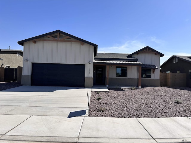 4236 W 31st Pl Lot 47-1572B, Yuma, AZ 85364 - modern farmhouse featuring board and batten siding, an attached garage, and concrete driveway