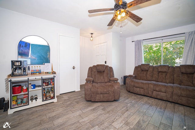 2231 S Elks Ln # 67, Yuma, AZ 85364 - living area with wood finished floors and a ceiling fan