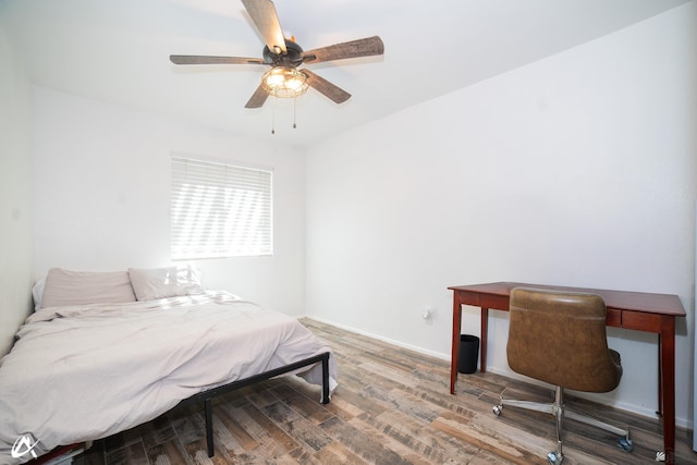 2231 S Elks Ln # 67, Yuma, AZ 85364 - bedroom featuring wood finished floors, ceiling fan, and baseboards