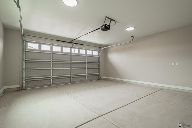 7972 E 34th Ln, Yuma, AZ 85365 - garage with baseboards and a garage door opener