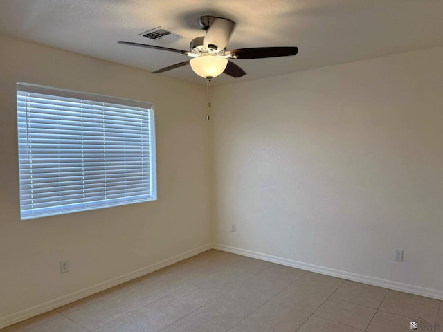 14713 E 52nd Dr, Yuma, AZ 85367 - unfurnished room featuring a ceiling fan, baseboards, and light tile patterned flooring